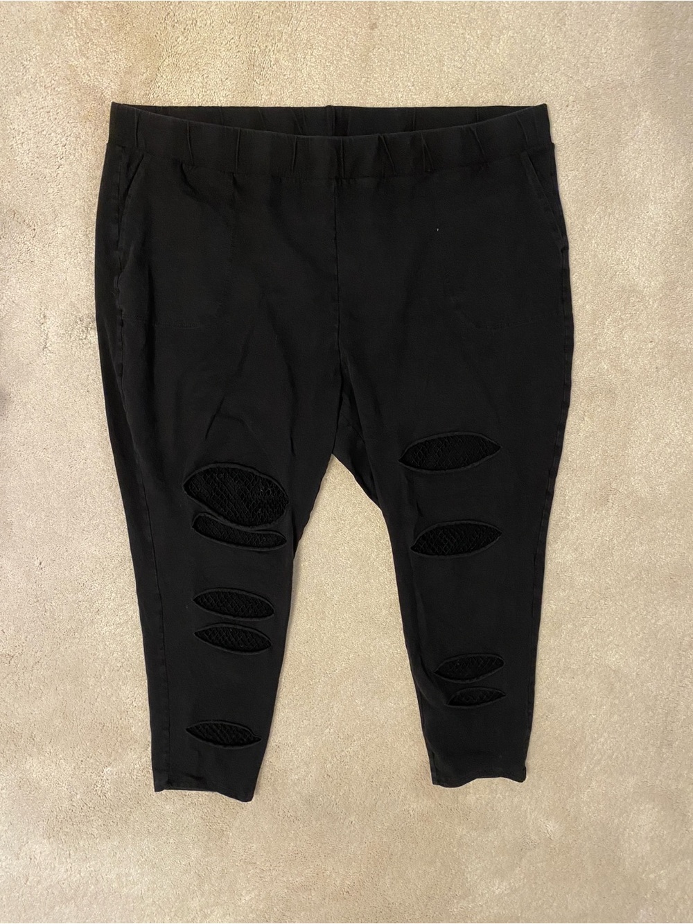 TORRID Distressed Fishnet Leggings Size 6